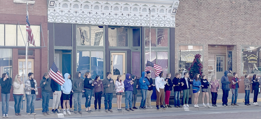 THE STOCKTON STUDENTS,TEACHERS AND MOURNERS lined up on both sides of Main Street on Monday, December 5th when the funeral motorcade for Rooks County Sheriff Department’s Patrol Officer Quintin Hue Silsby drove through the town on its way to his final resting place in Cawker City.