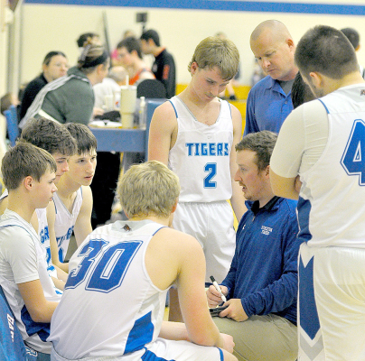 Trevor Miller instructing the Tigers during a timeout vs. Natoma