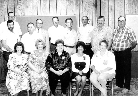 THE CLASS OF 1964 had held its reunion with six other classes at the St.Thomas Parish Center in August of 1994. Pictured are (seated from left): Lana (Stephen) Odle, Judy A. (Richardson) Sander, Dixie (Ives) Rose, Rita (Baxter) Sander, Martha (Conn) Baxter; (Standing) Larry Baxter, Don McLaughlin, Roland Johnston, David L. Rogers, John A. Berkley, Terry W. Odle, Larry B. Allen, Kinney Baxter and Tom Bigge.