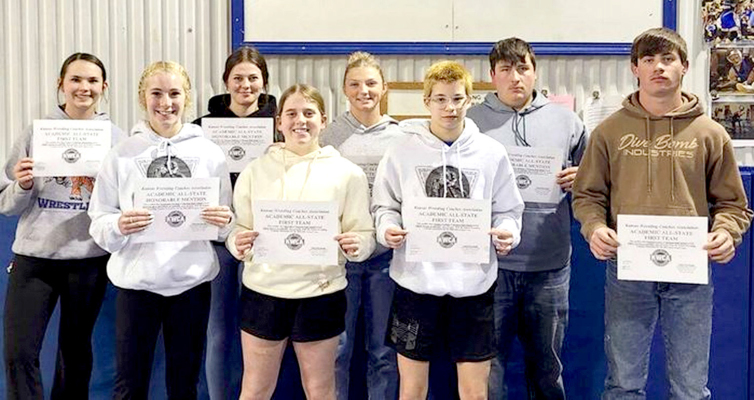 THE STOCKTON TIGER WRESTLERS show the academic awards they received from the Kansas Wrestling Coaches Association. They are (front row, from left) Temprance Northup, Mia Odle, Carolina Northup, Emerson Lowry; (back row) Shae Yohon, Shyanne Balthazor, Ashlyn Hahn, and Ryan Mongeau. (Not pictured is Rivver Long.)