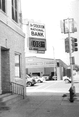 IN THE SUMMER OF 1991 the Stockton National Bank sign, located at the stoplight corner, recorded the temperature in Stockton at a hot 103 degrees!