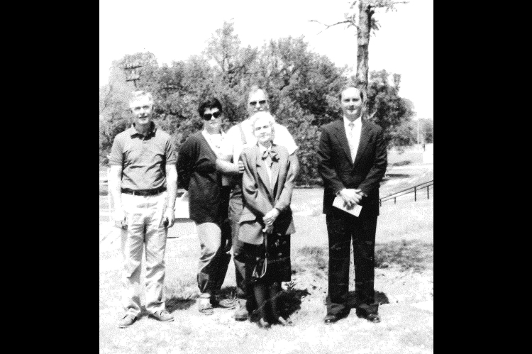 AN OAK TREE was planted in the Stockton City Park in memory of Wayne “Mac” McCaslin in 1991. Pictured at the dedication were Leo Bird, who had selected the tree; Janet and Leo Kollman, who donated the tree from their farm; Mabel McCaslin, Wayne’s wife; and Ed Hageman, president of the Stockton Rotary Club.